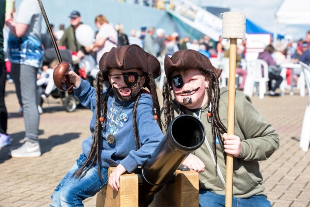 Two young boys dressed as pira